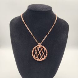 
Tri-Infinity Tensor Ring Copper Pendant – 144 Hz Frequency, Pure Copper Chain

Description:
This pendant features a pure copper tensor ring tuned to 