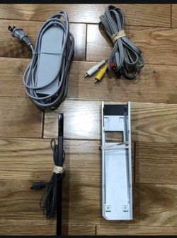 Nintendo Wii power supply, AV cable, stand and sensor bar