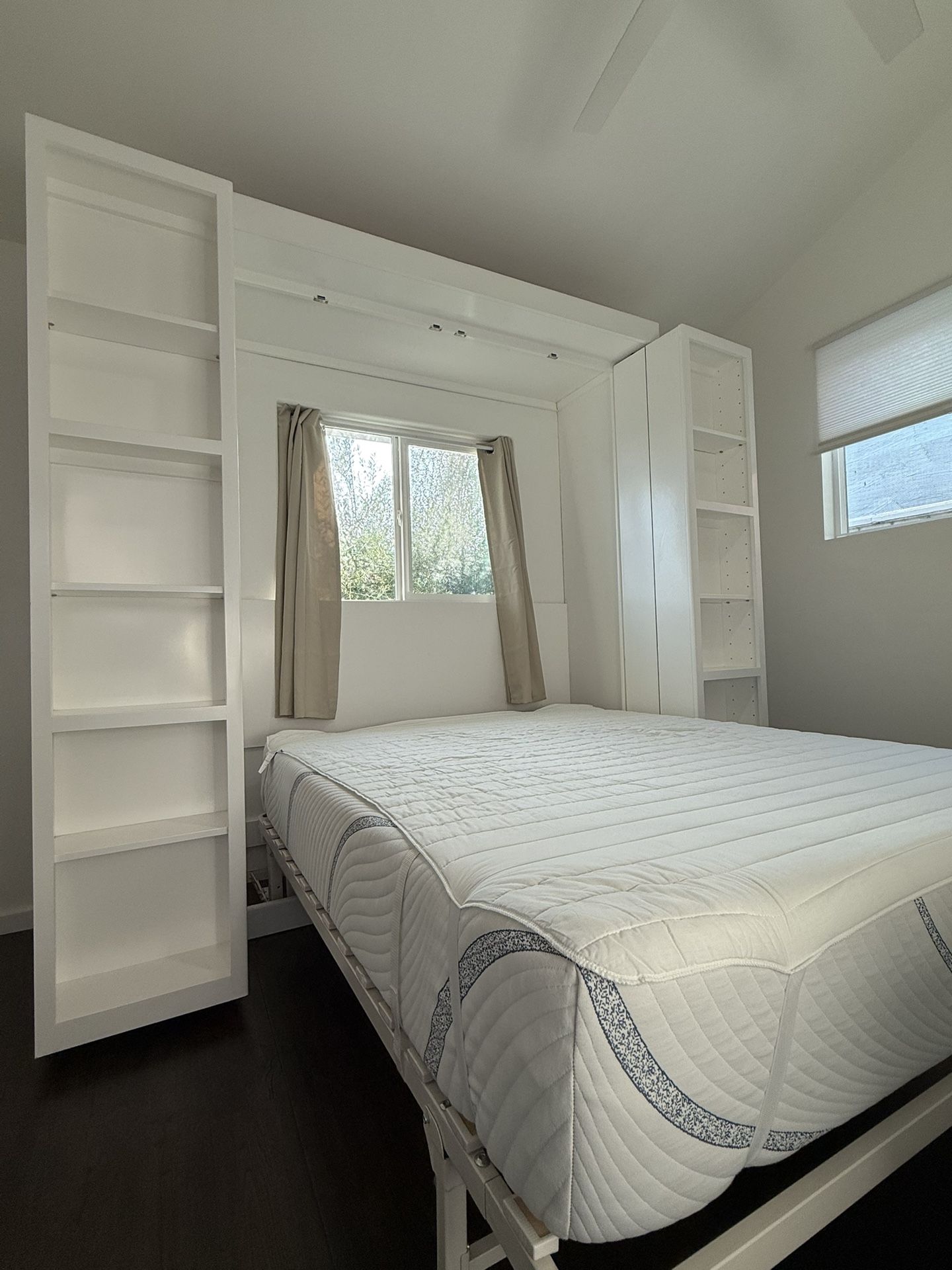 Modern White Murphy Bed with Built-In Shelving