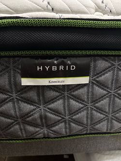 Hybrid Queen size mattress with hybrid base.