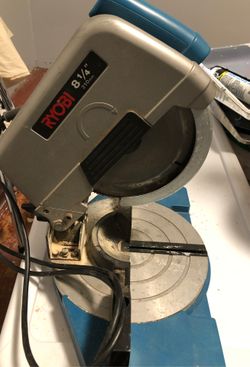 RYOBI TS-200. 8 1/4”. COMPOUND MITER SAW