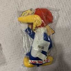 Brand new dog toy in original packaging. “Woody woodpecker”