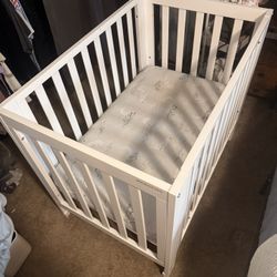 Mini Crib With Updated Mattress And Sheets 