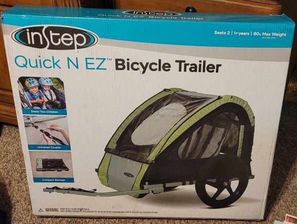 NEW IN BOX - INSTEP BICYCLE TRAILER FOR SALE $125 O.B.O.