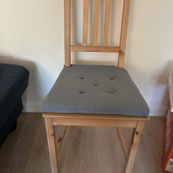 Ikea Chair With Blue Cushin
