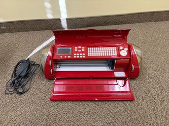 Cricut Cutting Machine + 5 Cartridges – $75