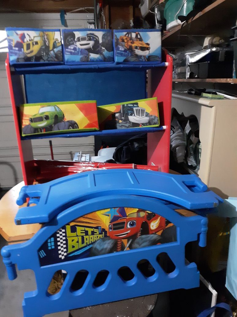 Toddler bed and toy storage