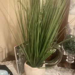 Artificial grass plant with vase