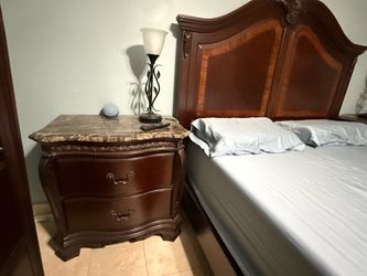 Room to go wood marble tops night stands set value 750