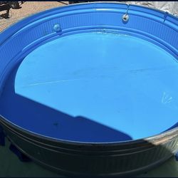 8’ round 2’ deep stock tank w/2 stage epoxy paint ,2 PUMps as well!!
