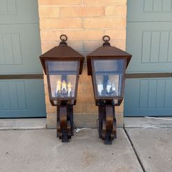 A PAIR OF XL CUSTOM OUTDOOR IRON WALL SCONCES.