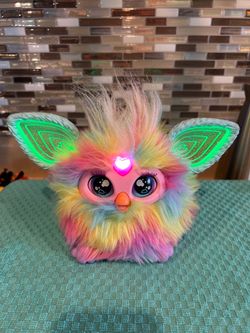 Hasbro 2023 Rainbow Tie-Dye Interactive Furby featuring vibrant pastel faux fur