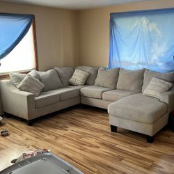 Couch for Sale has to go today NEGOTIABLE ON PRICE!!