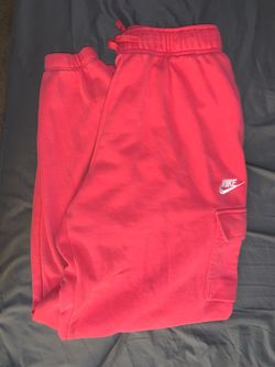 Hot pink women’s Nike sweat suit