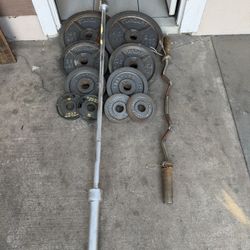Olympic weights 230lbs total plus curl bar and 7ft 45lbs bar firm price 