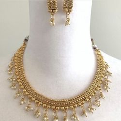 Gold Rodium Polish Off White color Necklace in Metal Alloy studded with Pearl