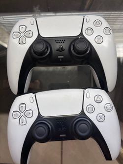 2 White PS5 Controllers