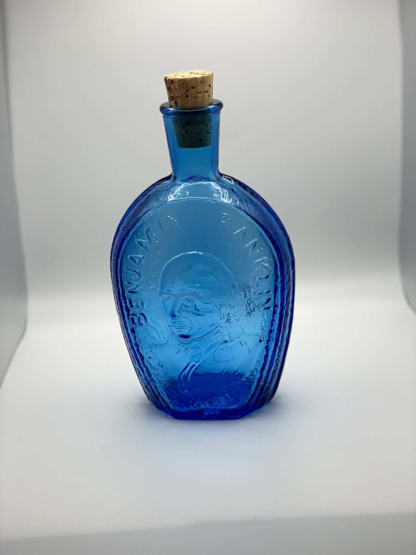 Glass House “ Benjamin Franklin”  Blue Corked Bottle