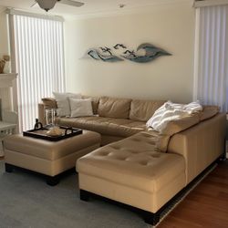 Elite leather designer Leather Sectional + Ottoman