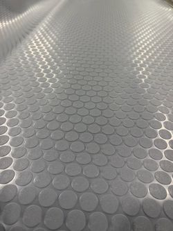 goma para cubrir pisos de metal o de madera