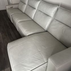 White leather reclining sectional couch