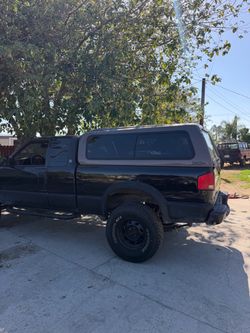 GMC Sonoma or s10 bed camper