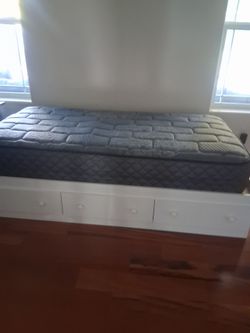 Twin bed and new mattress