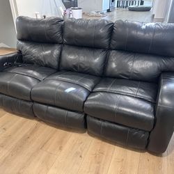 Pair Of Leather Reclining Sofas 