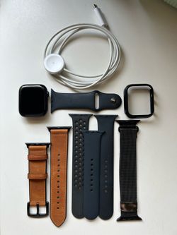 Apple Watch 7 with bands and charger