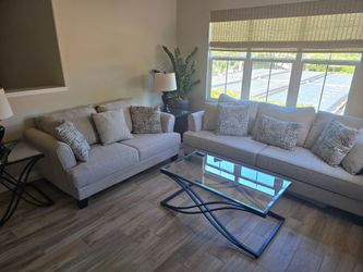 Great condition Sofa/Sleeper. Love seat, Tables and Lamps