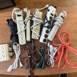 Random Assortment Of Power Strips And Extension Cords 