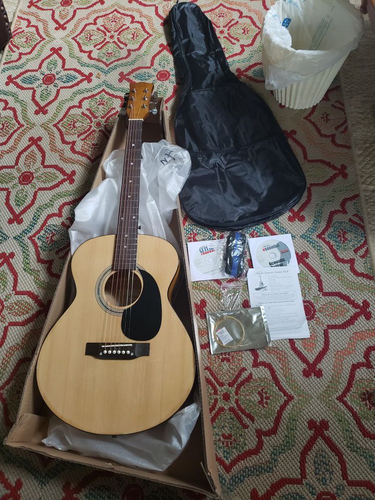 Brand new acoustic guitar "teach yourself" bundle with case, strings, strap, etc