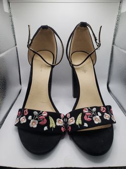 Size 7 pair of black strappy high-heel sandals from Charlotte Russe