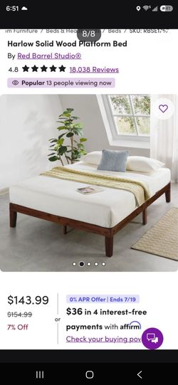 Excellent quality wood and metal bed frame in very good condition; full size.
