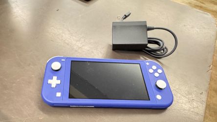 Nintendo Switch Lite  w charger no trades pick up in Tacoma FIRM PRICE