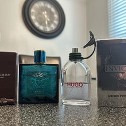 Assortment Of Colognes. Versace, Burberry And Invictus