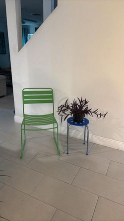 Green Metal Slatted Outdoor Chair, table with a Purple Heart wandering Jew plant all 3 items for $15