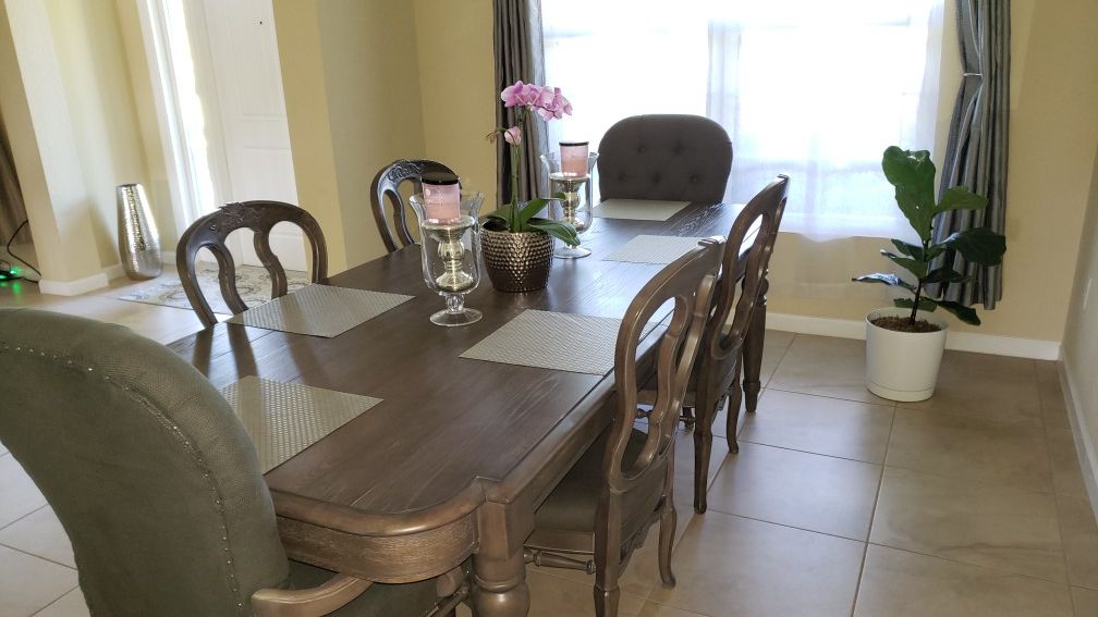 Grey Bernhardt dining room table with 6 chairs and leaf extension