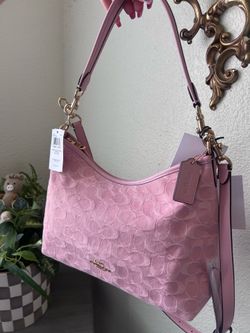 Pink denim Coach Laurel bag