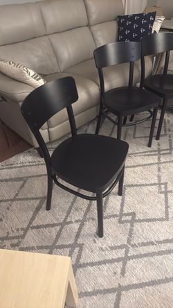 4 black chairs