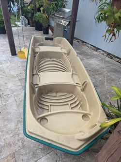 14 ft plastic john boat works great very stable now leaks light wight