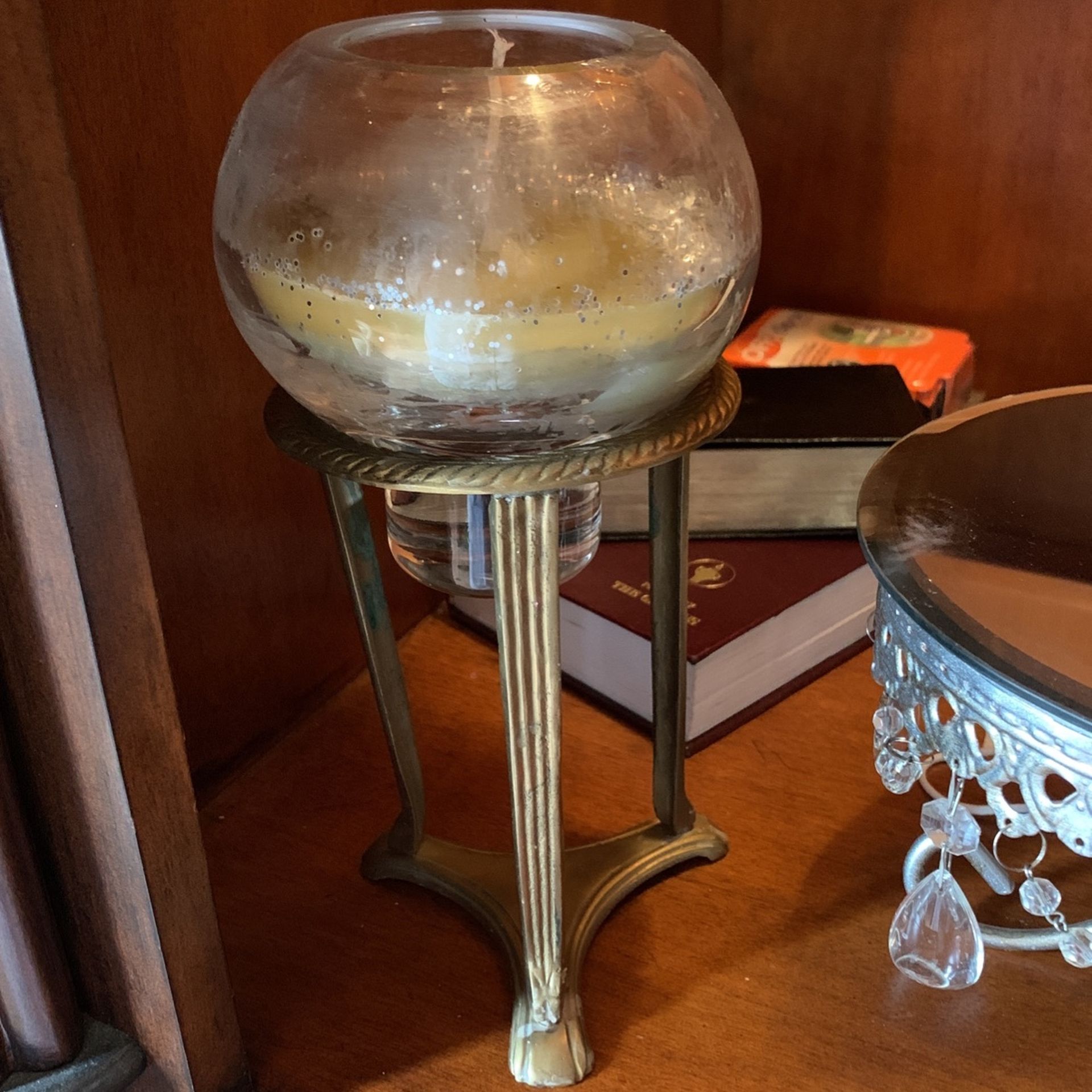 Solid crystal with candle and brass holder