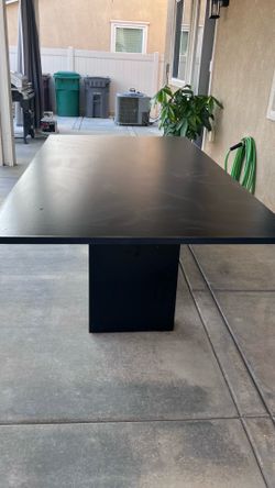 Heavy black dining/patio table
