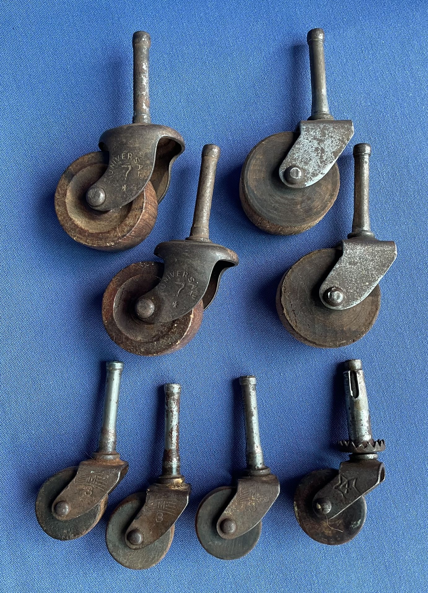 VINTAGE ANTIQUE CASTERS Lot OF 8 Metal/Wood 1.5" Shafts WHEELS 1”, 1 1/8”, 1.5”