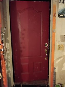 Red Exterior Door with Brass Knob