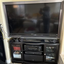 TV and Cabinet