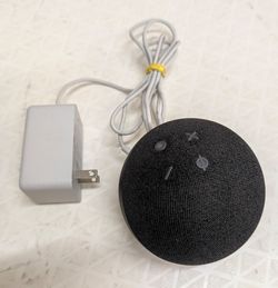 Amazon Echo Dot smart speaker 4th generation comes with power adapter. Model # B7W64E
