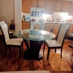 3-Piece Raymour & Flannigan Glass Top Table and 2- Chair Set (Used) $250