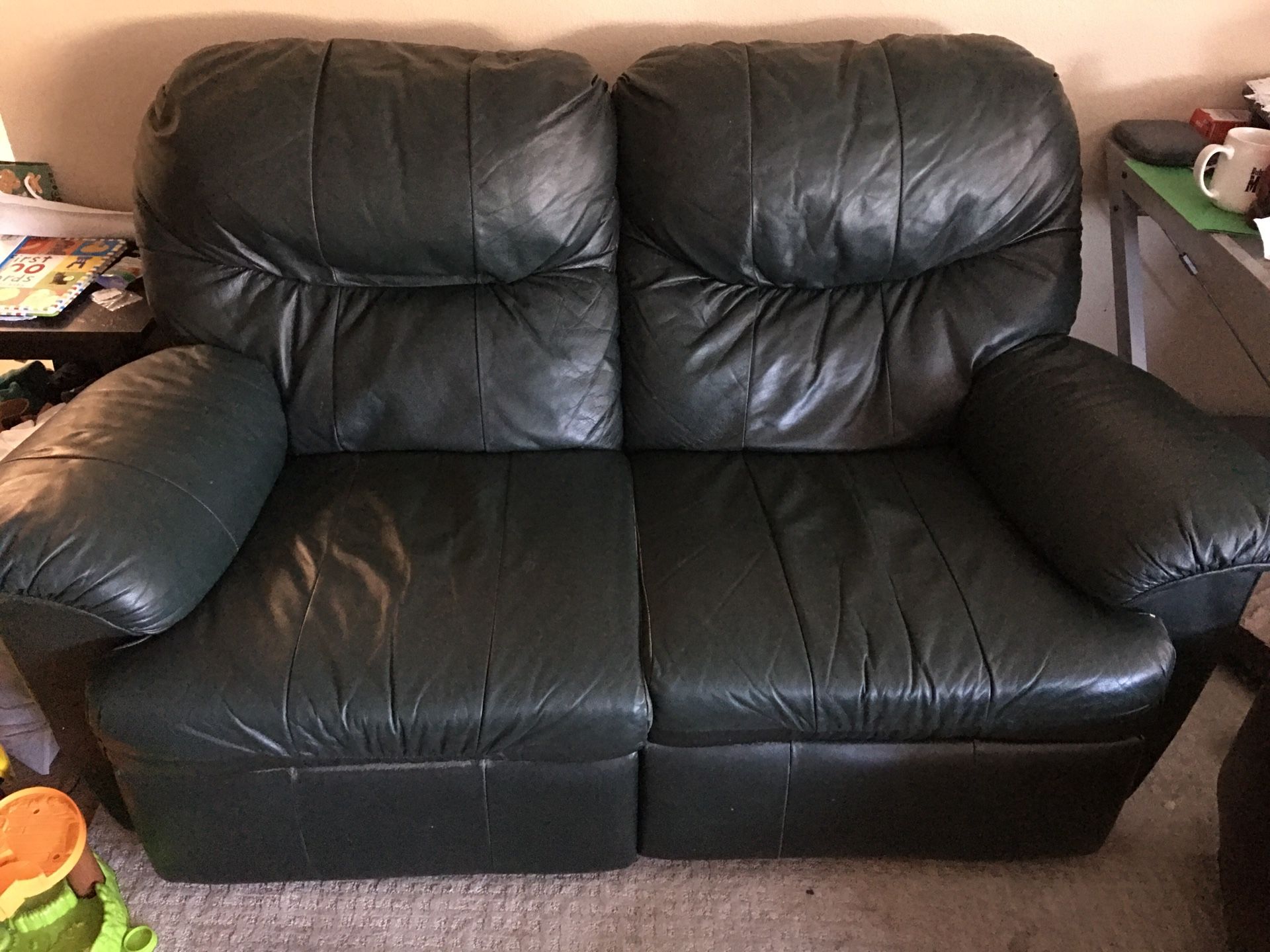 Green leather loveseat recliner