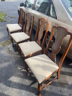 Four Wooden Dining Room Chairs
